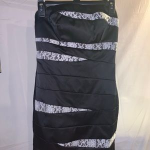 Strapless black dress with lace embellishments